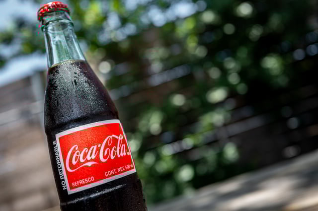 A bottle of Coca-Cola imported from Mexico is displayed on a table on July 17, 2025, in Austin, Texas.