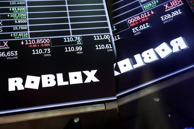 The Roblox logo is displayed on a screen on the floor at the New York Stock Exchange (NYSE) in New York City, U.S., July 15, 2025. REUTERS/Jeenah Moon/File photo