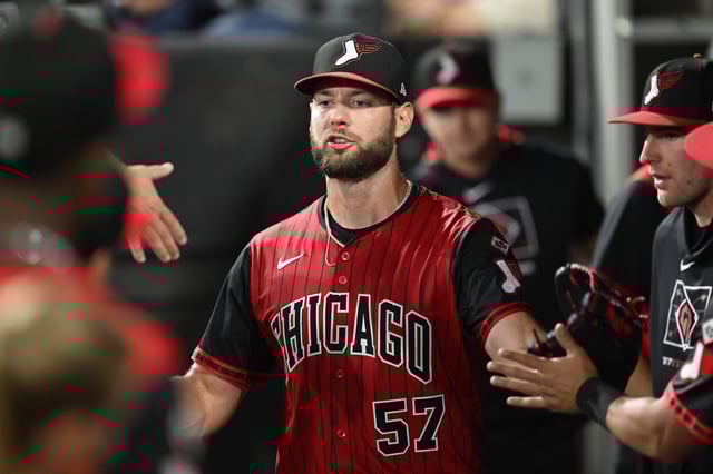 CHICAGO, ILLINOIS - JULY 25: Adrian Houser #57 of the Chicago White Sox in congratulated in the dugout after exiting the game against the Chicago Cubs during the seventh inning at Rate Field on July 25, 2025 in Chicago, Illinois.