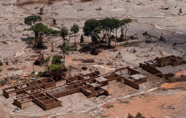 The debris of the municipal school of Bento Rodrigues district, which was covered with mud after a dam owned by Vale SA and BHP Billiton Ltd burst, is pictured in Mariana, Brazil, November 10, 2015.     REUTERS/Ricardo Moraes/File Photo