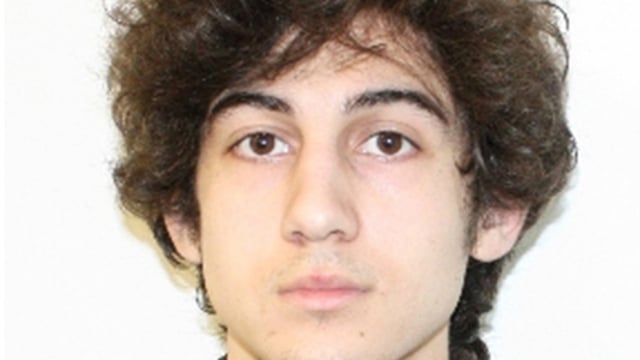 In this image released by the Federal Bureau of Investigation on April 19, 2013, Dzhokhar Tsarnaev, 19-years-old, a suspect in the Boston Marathon bombing is seen. After a car chase and shoot out with police one suspect in the Boston Marathon bombing, Tamerlan Tsarnaev, 26, was shot and killed by police early morning April 19, and a manhunt is underway for his brother and second suspect, 19-year-old suspect Dzhokhar A. Tsarnaev. The two are suspects in the bombings at the Boston Marathon on April 15, that killed three people and wounded at least 170. 