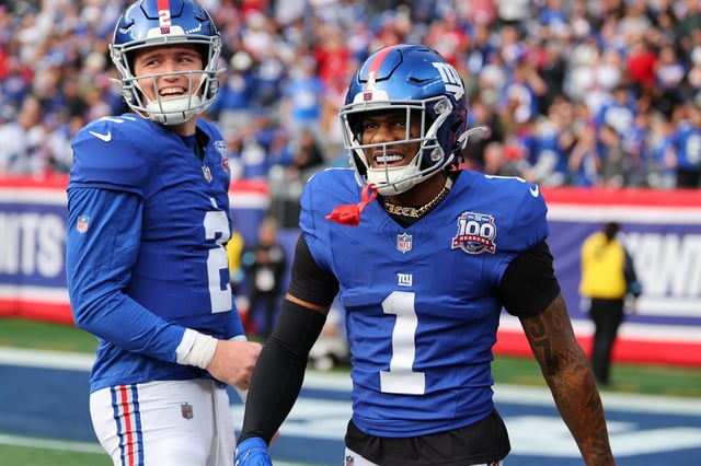 Quarterback Drew Lock #2 and Malik Nabers #1 of the New York Giants celebrate a first quarter touchdown during a game against the Indianapolis Colts at MetLife Stadium on December 29, 2024 in East Rutherford, New Jersey.