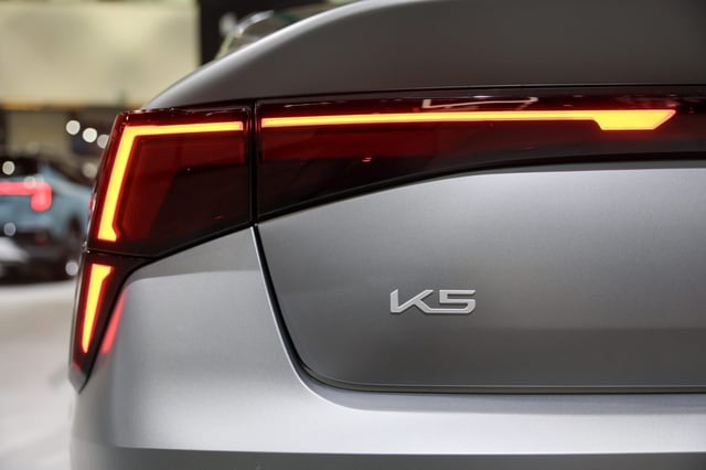 A detail of the Kia K5 during the 2024 LA Auto Show at the Los Angeles Convention Center on November 22, 2024 in Los Angeles, California.