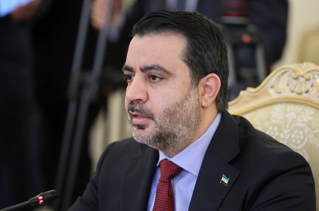 Syrian Foreign Minister Asaad Hassan al-Shibani attends a meeting with Russian Foreign Minister Sergei Lavrov in Moscow, Russia, July 31, 2025. REUTERS/Shamil Zhumatov/Pool