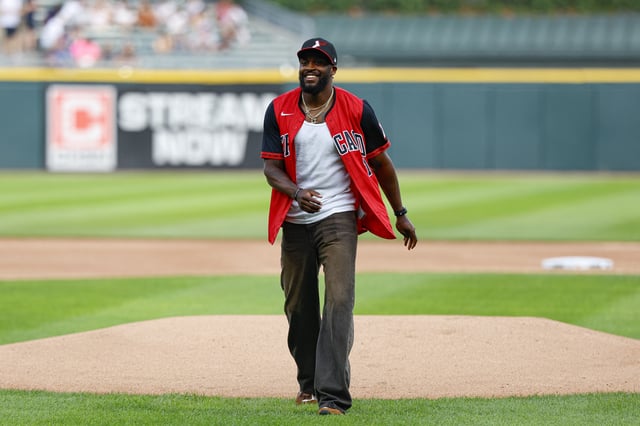 Jul 8, 2025; Chicago, Illinois, USA; Chicago Bears cornerback Jaylon Johnson throws out a ceremonial first pitch before a baseball game between the Chicago White Sox and Toronto Blue Jays at Rate Field. Mandatory Credit: Kamil Krzaczynski-Imagn Images/File Photo