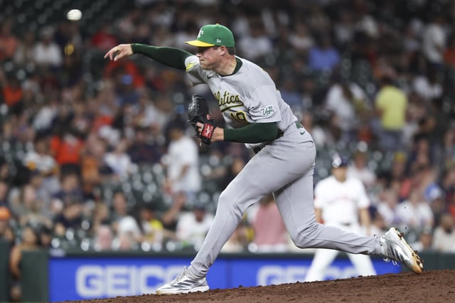 Jul 26, 2025; Houston, Texas, USA; Athletics relief pitcher Mason Miller (19) delivers a pitch during the ninth inning against the Houston Astros at Daikin Park. Mandatory Credit: Troy Taormina-Imagn Images/File Photo