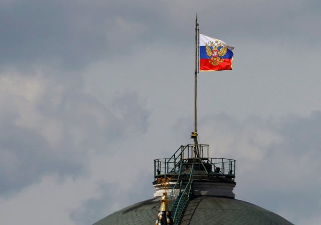 The Russian flag flies on the dome of the Kremlin Senate building in central Moscow, Russia, May 4, 2023. REUTERS/Stringer/File Photo