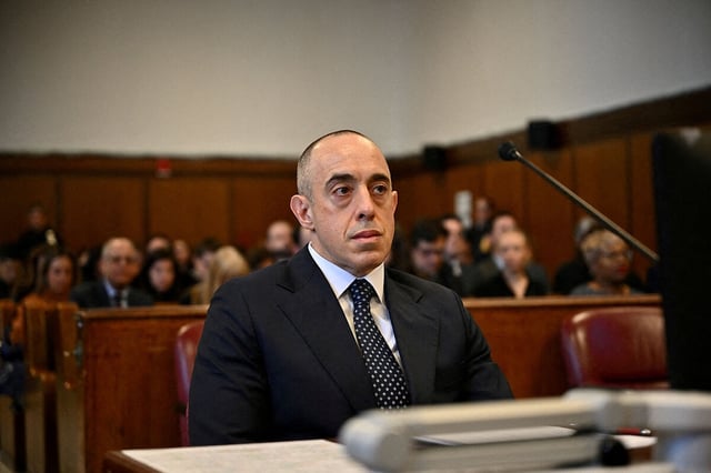Then-defense attorney Emil Bove looks on as his client Donald Trump appears remotely for a sentencing hearing in the criminal case in which he was convicted in 2024 on charges involving hush money paid to a porn star, at New York Criminal Court in Manhattan in New York City, on January 10, 2025.     