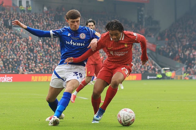 Rio Ngumoha of Liverpool and Josh Woods of Accrington Stanley Liverpool v Accrington Stanley, Emirates FA Cup, Third Round, Football, Anfield, Liverpool, UK - 11 Jan 2025 EDITORIAL USE ONLY No use with unauthorised audio, video, data, fixture lists, club/league logos or live services. Online in-match use limited to 120 images, no video emulation. No use in betting, games or single club/league/player publications. PUBLICATIONxINxGERxSUIxAUTxHUNxGRExMLTxCYPxROUxBULxUAExKSAxONLY Copyright: xPaulxGreenwood/Shutterstockx 15093714z