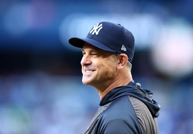 TORONTO, ON - JULY 21: Manager Aaron Boone #17 of the New York Yankees looks on during batting practice before a game against the Toronto Blue Jays at Rogers Centre on July 21, 2025 in Toronto, Ontario, Canada.