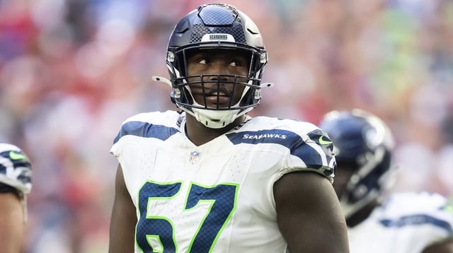 Dec 8, 2024; Glendale, Arizona, USA; Seattle Seahawks offensive tackle Charles Cross (67) against the Arizona Cardinals at State Farm Stadium. Mandatory Credit: Mark J. Rebilas-Imagn Images