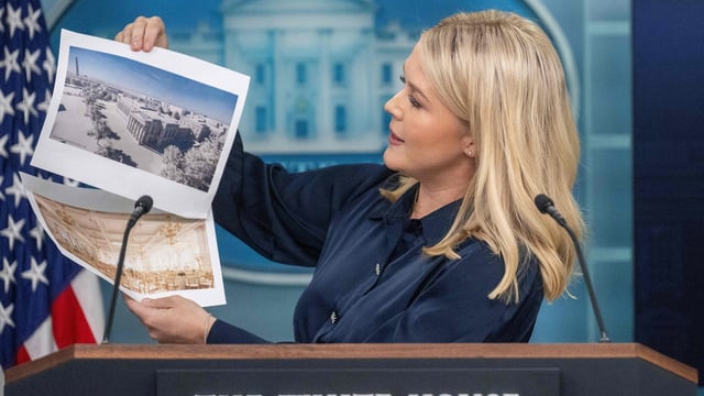White House Press Secretary Karoline Leavitt displays a rendering for a new White House ballroom.
