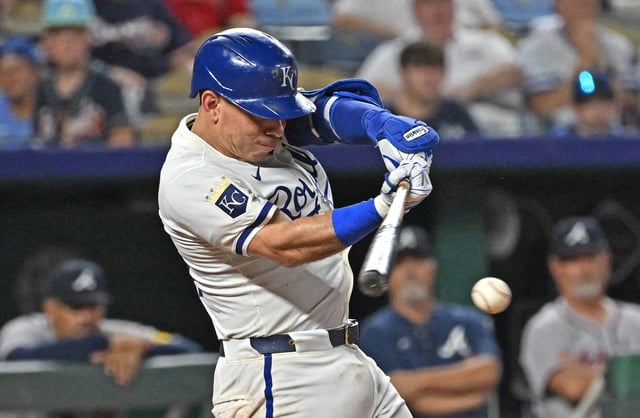 Jul 28, 2025; Kansas City, Missouri, USA;  Kansas City Royals catcher Freddy Fermin (34) singles in two run in the ninth inning against the Atlanta Braves at Kauffman Stadium. Mandatory Credit: Peter Aiken-Imagn Images/File Photo