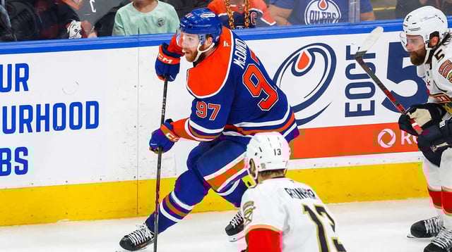 Jun 14, 2025; Edmonton, Alberta, CAN; Edmonton Oilers center Connor McDavid (97) skates with the puck against the Florida Panthers during the second period in game five of the 2025 Stanley Cup Final at Rogers Place. Mandatory Credit: Sergei Belski-Imagn Images