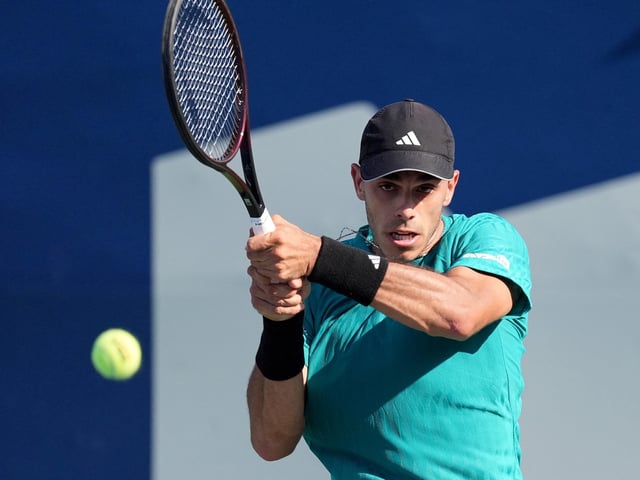 Jul 29, 2025; Toronto, ON, Canada; Francisco Cerundolo (ARG) hits a ball to Jaume Munar (not pictured) during the second round at Sobeys Stadium. Mandatory Credit: John E. Sokolowski-Imagn Images