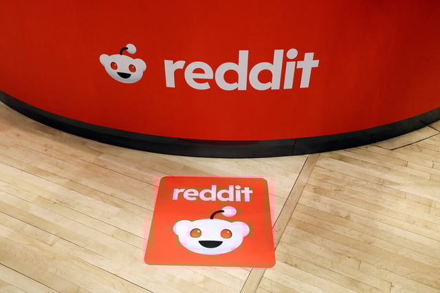 Reddit's logo is displayed, at the New York Stock Exchange (NYSE) in New York City, U.S., March 21, 2024. REUTERS/Brendan McDermid/File Photo