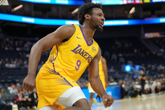 Bronny James #9 of the Los Angeles Lakers reacts after a slam dunk against the Miami Heat during the first half of the California Classic summer league game at Chase Center on July 06, 2025 in San Francisco, California.
