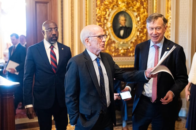 From left, Sen. Raphael Warnock, D-Ga., Sen. Peter Welch, D-Vt., and Sen. John Hickenlooper, D-Colo., leave the Senate Democrats’ lunch in the U.S. Capitol on July 15. Welch has introduced a bill that would carve out small businesses from tariffs imposed under President Donald Trump.