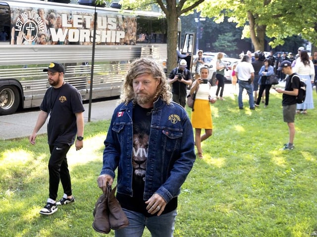 Pro Maga and Christian singer Sean Feucht gets ready for his performance at Ministerios Restauración in Montreal on Friday, July 25, 2025.