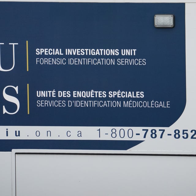 A Special Investigations Unit logo is seen on a truck at Toronto Pearson International Airport, in Mississauga, Ont., on Thursday, April 24, 2025. THE CANADIAN PRESS/Arlyn McAdorey
