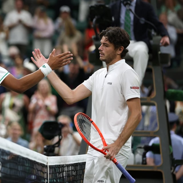 After winning in a five-set thriller at Wimbledon against Gabriel Diallo, Taylor Fritz (right) was complimentary to his young opponent, praising his serving ability.