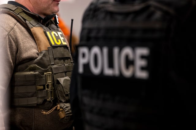 US Immigration and Customs Enforcement (ICE) agents, along with other federal law enforcement agencies, attend a pre-enforcement meeting in Chicago, Illinois, US, on Sunday, Jan. 26, 2025. President Donald Trump has pledged to carry out the largest deportation effort in US history, vowing to ultimately deport all of the foreigners living in the country without permission. Photographer: 