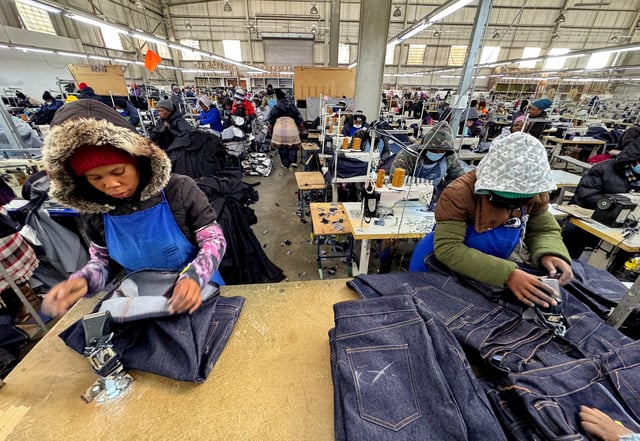 Workers execute their duties at the Afri-Expo Textile Factory, which makes clothing for the U.S. market, on the outskirts of Maseru, the capital of Lesotho, July 9, 2025. REUTERS/Siyabonga Sishi/File Photo