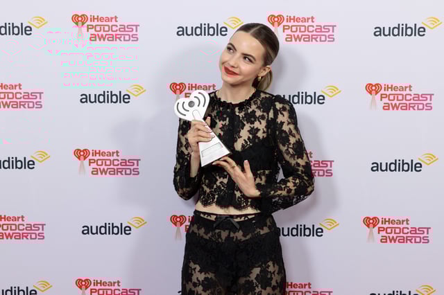 Bobbi Althoff poses with her award backstage at the 2024 iHeartPodcast Awards presented at the Fairmont Hotel in Austin, Texas on March 11, 2024.