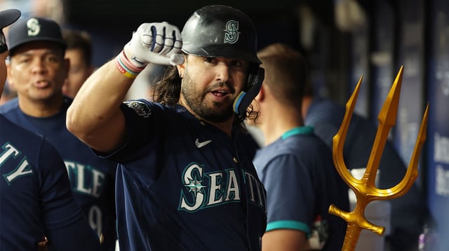 Sep 8, 2023; St. Petersburg, Florida, USA; Seattle Mariners third baseman Eugenio Suarez (28) celebrates in the dugout after he hit a home run against the Tampa Bay Rays during the second inning at Tropicana Field. Mandatory Credit: Kim Klement Neitzel-Imagn Images