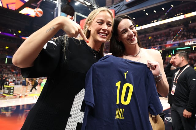 Sophie Cunningham and Caitlin Clark of the Indiana Fever pose and cheer for teammate Lexie Hull in the Kia WNBA Skills Challenge during the 2025 AT&amp;T WNBA All-Star weekend at Gainbridge Fieldhouse on July 18, 2025 in Indianapolis, Indiana.