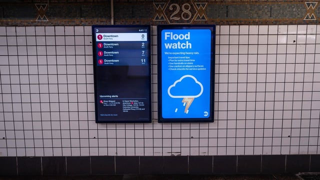 A flood watch warning inside an NYC subway station. 