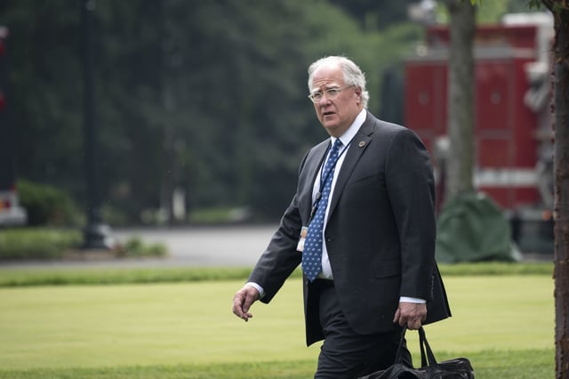 Senior Adviser to US President Joe Biden Mike Donilon walks to Marine One on the South Lawn of the White House in Washington, DC. on July 21, 2021.