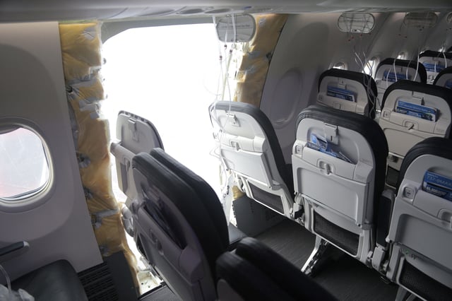 The fuselage plug area of Alaska Airlines Flight 1282 Boeing 737-9 MAX, which was forced to make an emergency landing with a gap in the fuselage, is seen during its investigation by the National Transportation Safety Board (NTSB) in Portland, Oregon, U.S. January 7, 2024.  NTSB/Handout via REUTERS/File Photo