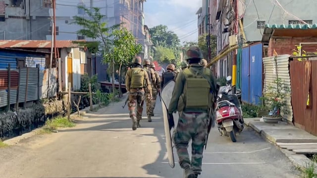 Security forces also recovered two firearms, including an AK rifle with a magazine.