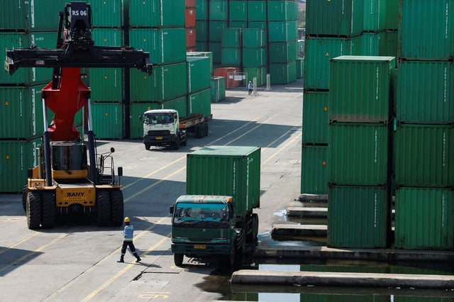 A container truck is unloaded from a truck at Tanjung Priok Port in North Jakarta, Indonesia,  July 8, 2025. REUTERS/Ajeng Dinar Ulfiana/File Photo