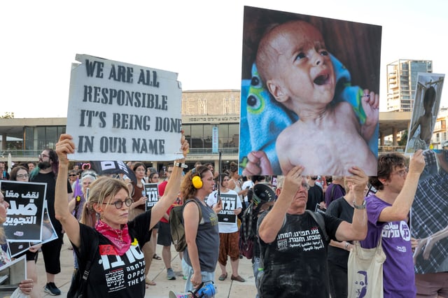 Israelis protest in Tel Aviv on July 22, 2025. (Jack Gueza/AFP via Getty Images)