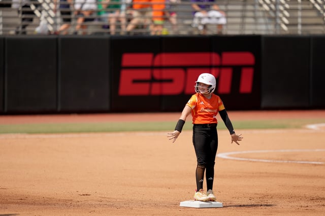 Southwest Region team shakes off the dirt after stealing second base against the North Carolina Region team during the 2024 Little League Softball World Series championship game on August 11, 2024 at Max R. Joyner Family Stadium in Greenville, North Carolina.