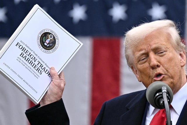 U.S. President Donald Trump delivers remarks on reciprocal tariffs during an event in the Rose Garden entitled “Make America Wealthy Again” at the White House in Washington, D.C., on Wednesday, April 2, 2025. (Brenden Smialowski/AFP/Getty Images North America/TNS)