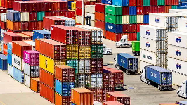 Cargo containers line a shipping terminal at the Port of Oakland on Thursday, July 31, 2025, in Oakland, Calif. (AP Photo/Noah Berger)