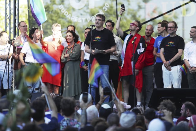 FILE - Budapest mayor Gergely Karacsony, center, addresses participants in the Pride march in Budapest, Hungary, Saturday, June 28, 2025. (AP Photo/Rudolf Karancsi, File)