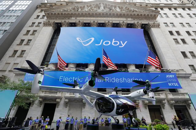 The Joby Aviation Air Taxi is seen outside the New York Stock Exchange (NYSE) in Manhattan, New York City, U.S., August 11, 2021. REUTERS/Andrew Kelly/File Photo