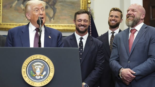 President Donald Trump, from left, speaks as professional golfer Bryson DeChambeau, Kansas City Chiefs kicker Harrison Butker and WWE CCO Triple H listen on Thursday during the Presidential Fitness Test executive order signing ceremony. (JACQUELYN MARTIN/APn)