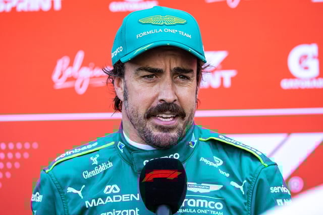 Fernando Alonso of Spain and Aston Martin F1 Team speaks in the media pen during Sprint qualifying ahead of the F1 Grand Prix of Belgium at Circuit de Spa-Francorchamps on July 25, 2025 in Spa, Belgium.