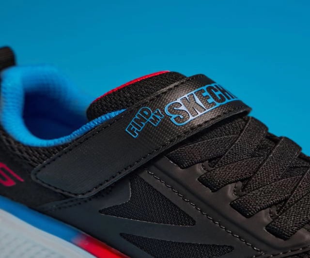 Black shoe with Find My Skechers printed on the strap
