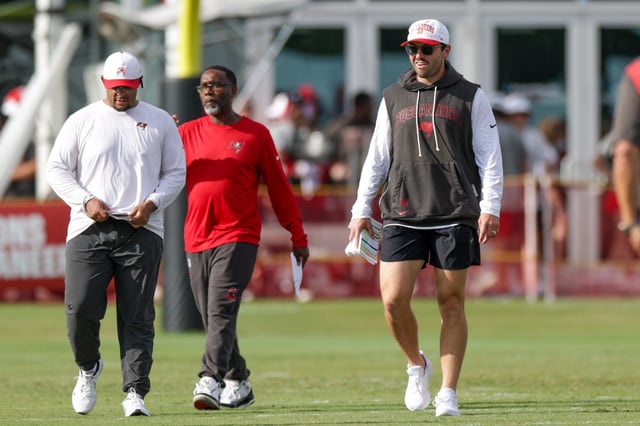 Aug 1, 2025; Tampa, FL, USA; Tampa Bay Buccaneers quarterback Baker Mayfield (6) looks on during training camp at AdventHealth Training Center. Mandatory Credit: Nathan Ray Seebeck-Imagn Images
