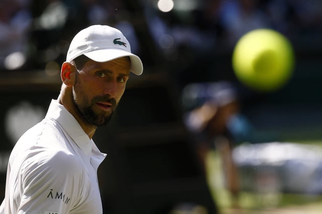 Tennis - Wimbledon - All England Lawn Tennis and Croquet Club, London, Britain - July 11, 2025 Serbia's Novak Djokovic looks on during his semi final match against Italy's Jannik Sinner REUTERS/Stephanie Lecocq/ File Photo