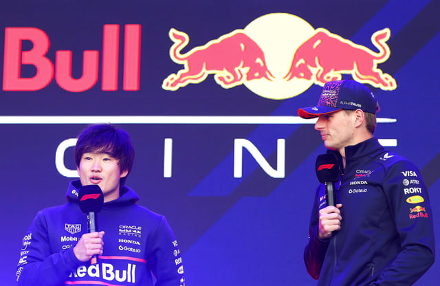 Yuki Tsunoda of Japan and Oracle Red Bull Racing and Max Verstappen of the Netherlands and Oracle Red Bull Racing talk to the crowd on the fan stage prior to the Sprint ahead of the F1 Grand Prix of Belgium at Circuit de Spa-Francorchamps on July 26, 2025 in Spa, Belgium.