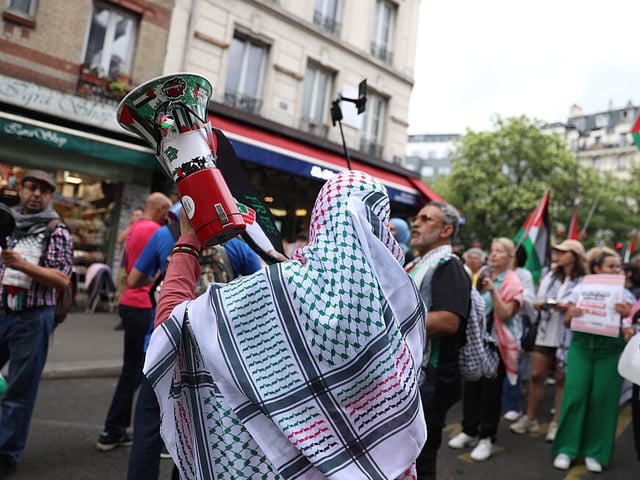 PARIS, FRANCE - JULY 31: People gather to stage a pro-Palestinian protest in Paris, France on July 31, 2025. (Photo by Mohamad Salaheldin Abdelg Alsayed/Anadolu via Getty Images)
