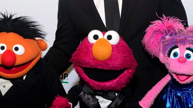 Federal funding cuts threaten the future of programs like Sesame Street and Daniel Tiger's Neighborhood. (Photo by Charles Sykes/Invision/AP)