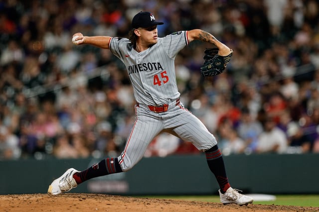Jul 18, 2025; Denver, Colorado, USA; Minnesota Twins relief pitcher Travis Adams (45) pitches in the eighth inning against the Colorado Rockies at Coors Field. Mandatory Credit: Isaiah J. Downing-Imagn Images/File Photo